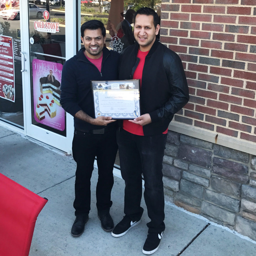 The ribbon cutting a Cold Stone Creamery Franchise in Dunkirk, MD in May 2017 Saif Shah (left) and Numaan Shah (right) 